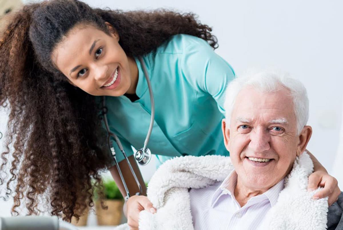Caregiver assisting senior with daily activities